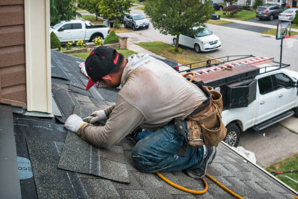 Professional Roofing technician working in Streetman, TX